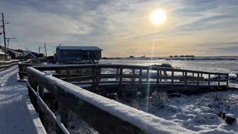 Alaska Organized Militia members, assigned to Task Force Bethel, survey Nightmute, Alaska, while conducting post-storm recovery efforts for Operation Halong Response on Oct. 27, 2025.