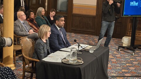 State Budget Director Jen Flood and incoming Department of Technology, Management, and Budget Director Kyle Guerrant present Governor Gretchen Whitmer's last budget proposal on February 11, 2026.
