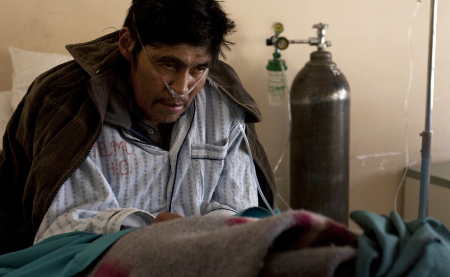 Saturnino Soncko, 58, has been inhaling the fine dust at the silver mines of Cerro Rico for years. He is now extremely ill, gasping for breath in the pulmonary wing of a public hospital in Potosi, Bolivia.