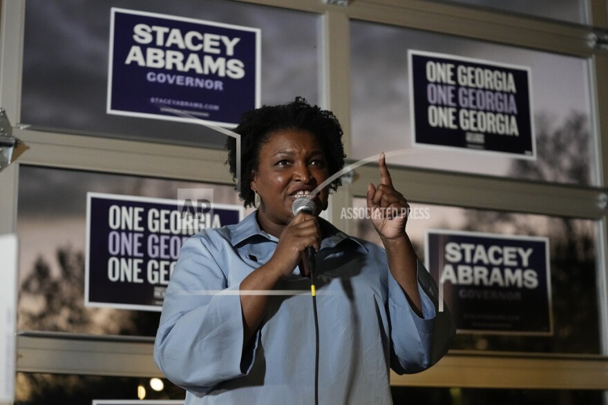 FILE - Democratic candidate for Georgia governor Stacey Abrams speaks to volunteers during an election eve phone and text bank party, Nov. 7, 2022, in Atlanta. Howard University in Washington announced Wednesday, April, 5, 2023, that Abrams would be joining its faculty. (AP Photo/John Bazemore, File)