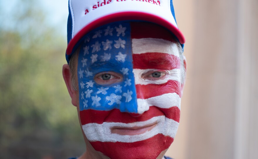 A soccer fan in Seattle painted his face red, white and blue to support the U.S. men's soccer team on July 6.