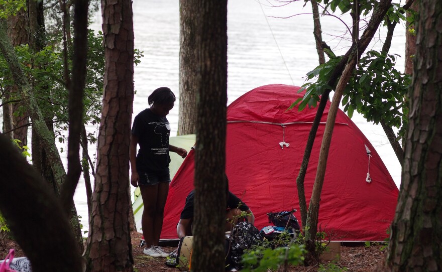 A youth group sets up camp at Jordan Lake State Recreation Area.