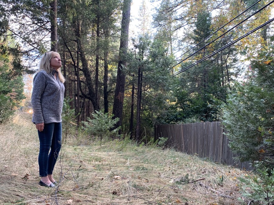 Magalia resident Tammy Waller says it's unbelievable that even after the deadliest wildfire in California history was ignited by PG&E's faulty equipment, there are still power lines in her neighborhood perilously close to dense strands of trees and brush.