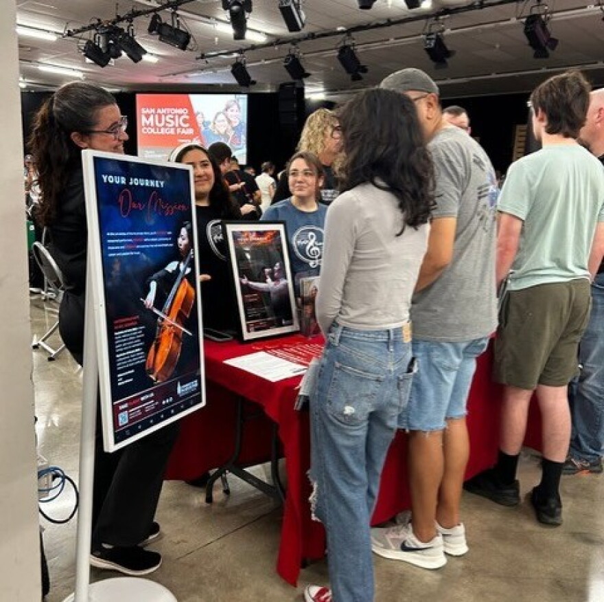 Students meet with college representatives to talk about their future