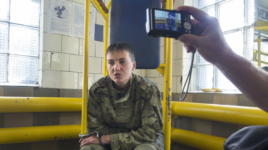 Ukrainian military officer Nadezhda Savchenko speaks to journalists shortly after her capture in Luhansk, Ukraine, on June 19, 2014. She was apparently captured by pro-Russian insurgents during fighting in eastern Ukraine. But she is being held in Russia, which claims she was arrested in that country. Ukrainian officials say the separatists handed her over to Russia.