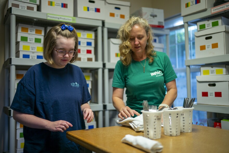 IMPACT student Tess works with teacher Kitty Sangster