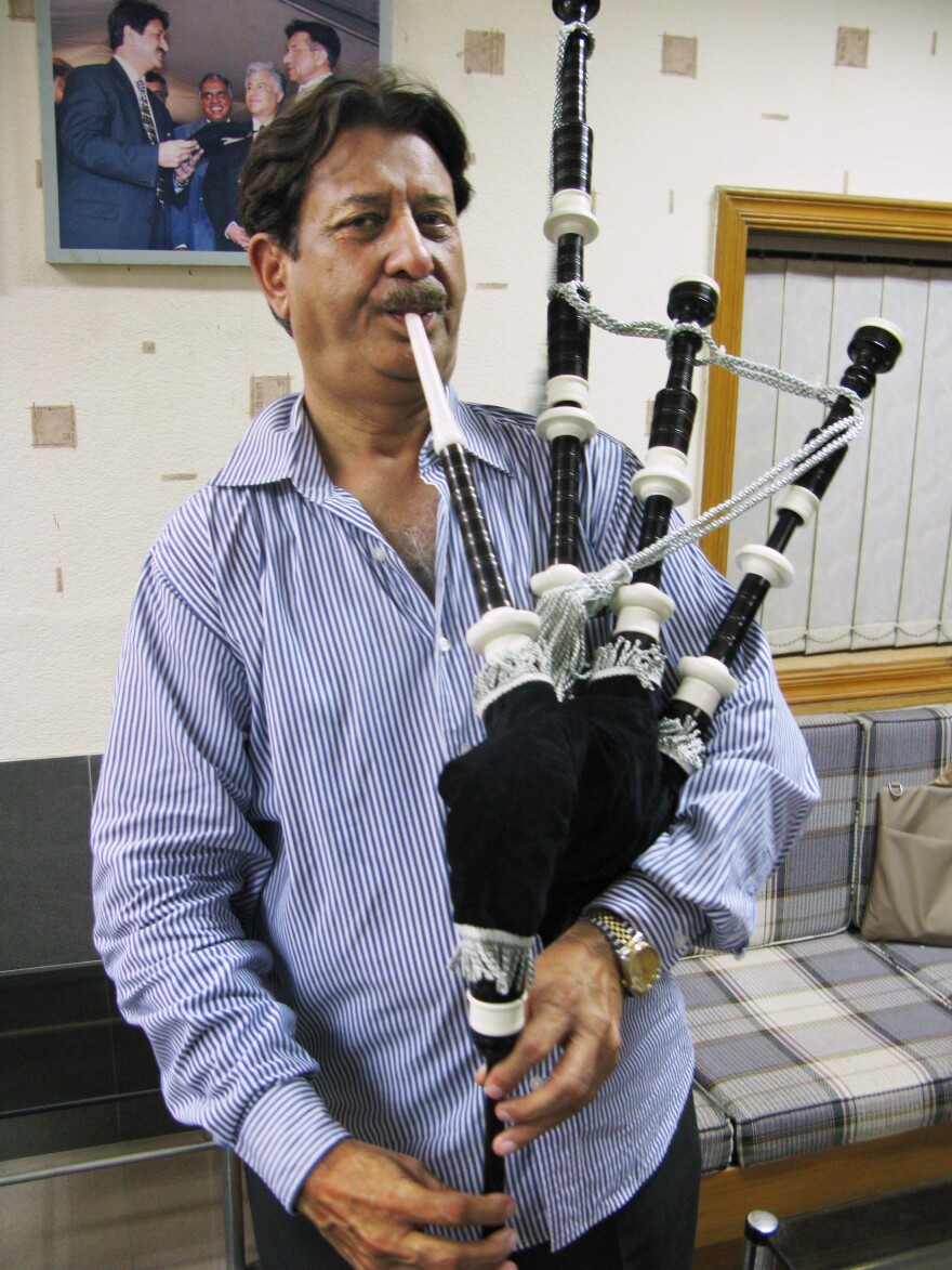 Naeem Akhbar is chief executive of Halifax and Co., a more than 70-year-old bagpipe manufacturer in Sialkot. Here, he plays the most expensive bagpipe his company produces, which sells for $700 in Pakistan and more than $1,600 in Europe and the U.S.
