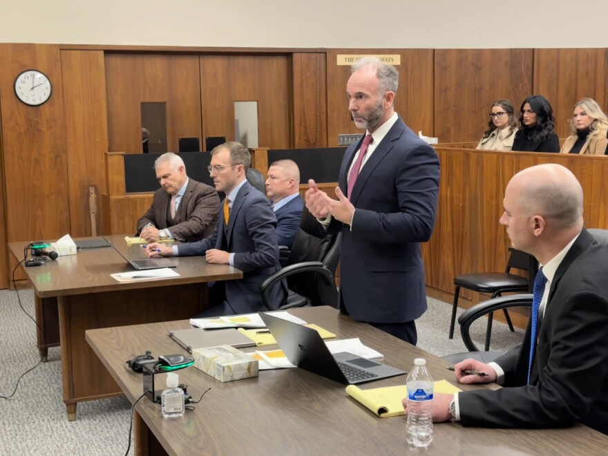 Special Prosecutor Ric Hertel, standing, says he plans to file criminal charges against Misty Noel, wife of former Clark County Sheriff Jamey Noel. The former sheriff is facing 15 felonies including theft and ghost employment.