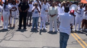 Imani Barnes leads Saturday's peace rally near Rochester City Hall