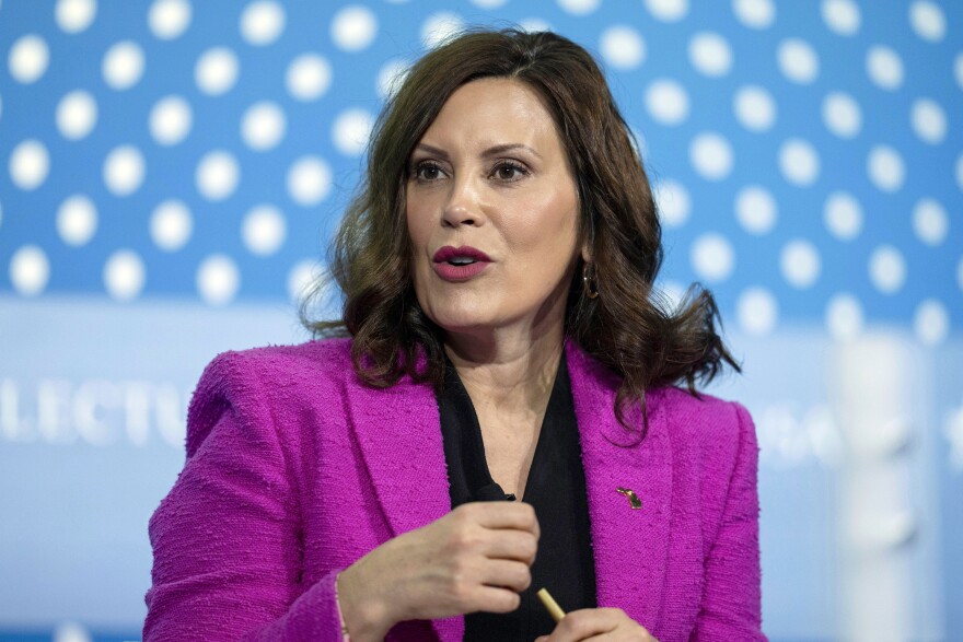 Michigan Gov. Gretchen Whitmer speaks at the SelectUSA Investment Summit, May 4, 2023, in Oxon Hill, Md. Nearly three years after authorities foiled a bizarre plot to kidnap Whitmer, the last defendants accused of taking part, Eric Molitor and brothers William Null and Michael Null, go on trial Monday, Aug. 21.