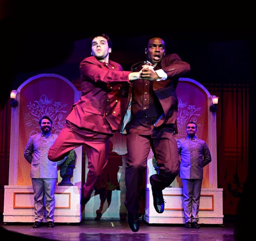 Errol Service Jr. and Nate Walsh as the dancing manager and bellman of the Beverly Wilshire Hotel.