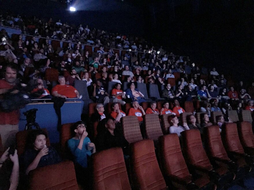  An audience of mostly millennial voters watches the first presidential debate in the Gateway Theatre in Columbus.