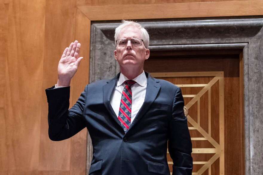 (L-R) FBI Director, Christopher Wray; National Counterterrorism Center Director ,Christopher Miller; and Deputy Homeland Security Secretary, Ken Cuccinelli, are sworn in before a Senate Homeland Security and Governmental Affairs Committee hearing on "Threats to the Homeland" on Capitol Hill in Washington, DC, on September 24, 2020. (Photo by Tom Williams / POOL / AFP) (Photo by TOM WILLIAMS/POOL/AFP via Getty Images)