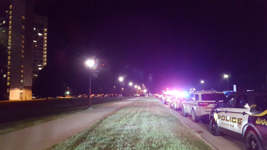 The scene on the night of the shooting. Thompson Hall is on the left.