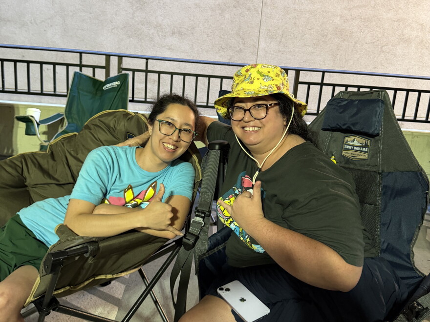Pokémon fans Kimberly, left, and Ashley, right, await the 30th anniversary release on the morning of Sept. 16, 2026.
