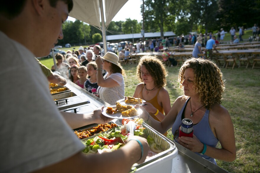 Attendees queue up for dinner at the 2018 Culture Camp.