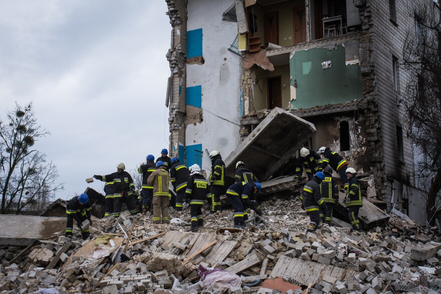 Emergency crews work to clear rubble. More than 200 people have been reported missing, officials said. Most are presumed dead.