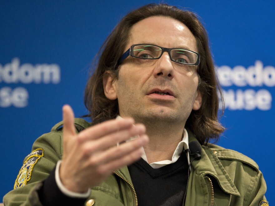 Jean-Baptiste Thoret, <em>Charlie Hebdo</em>'s film critic, speaks at a news conference in Washington on May 1. Thoret will receive, on behalf of <em>Charlie Hebdo</em>, the PEN American Center's Freedom of Expression Courage Award in New York on Tuesday.