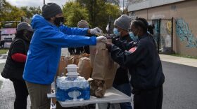 Members World Central Kitchen distribute food to voters and poll workers at a polling station in Washington, DC during early voting.