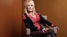 FILE - Dolly Parton poses at the Carnegie Medal of Philanthropy Ceremony in New York, on Oct. 13, 2022.
