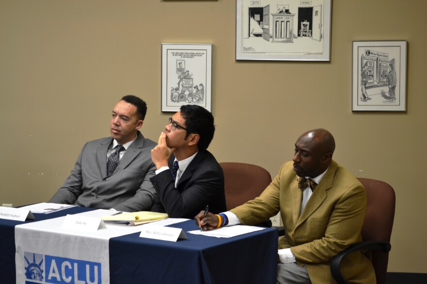 Ferguson-Florissant parent Redditt Hudson (left), ACLU attorney Dale Ho, and past school board candidate Willis Johnson at a press conference announcing a lawsuit against the Ferguson-Florissant schools on December 18, 2014. A federal appeals court ruled Tuesday the district's method of electing members to the school board violated the Voting Rights Act.