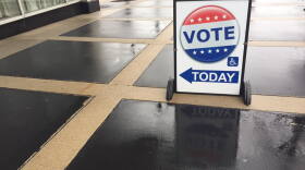 Vote Today sign on a sidewalk