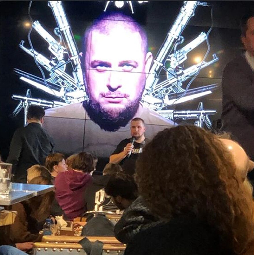 An explosion at a Russian cafe kills a prominent military blogger and ...