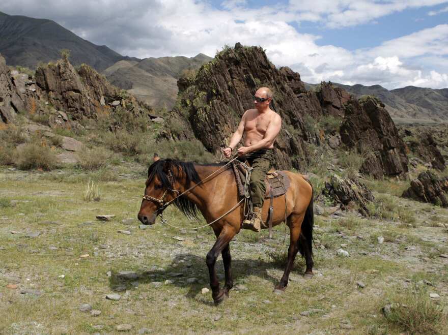 Putin, who was prime minister at the time, rides a horse in southern Siberia's Tuva region on Aug. 3, 2009.