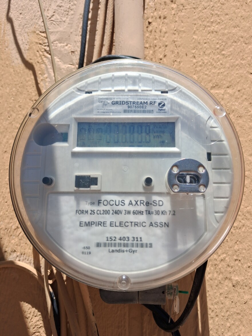 An Empire Electric meter outside a home in Cortez. Local utility customers may see higher summer bills as cooling demand rises and a purchased-power adjustment takes effect.