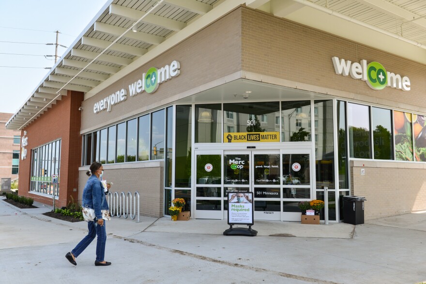 Cynthia Taylor, a stockholder in Merc Co-op, visits the grocery story Friday (Sept. 18). She said she's already a huge fan of the store for its convenience and visits every week to pick up a little something. "I think it's a great idea and great location," she said.