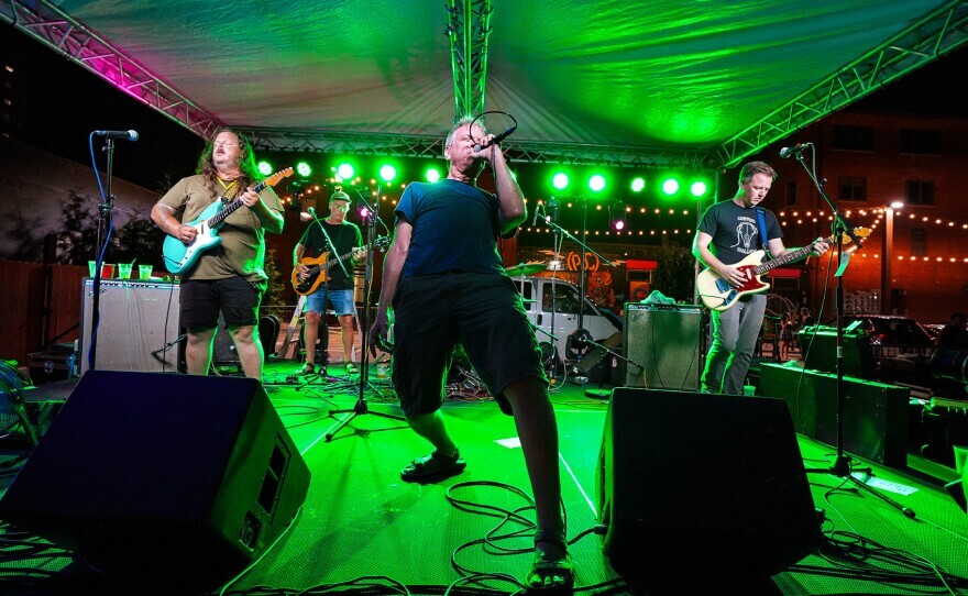 Running Man performs outside Stompbox Brewing to close out Alternating Currents' Saturday night.