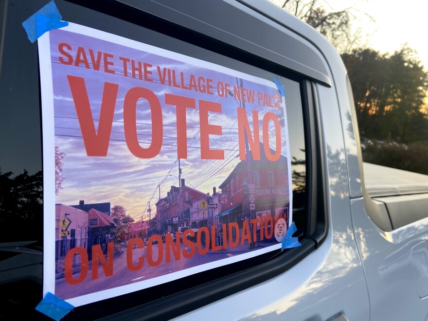 A "Vote no on consolidation" outside of the New Paltz Community Center