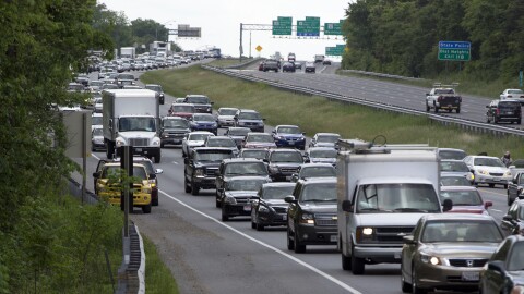 FILE - Traffic is seen on Interstate 495, the Capital Beltway, May 23, 2014, near Andrews Air Force Base, Md. Maryland vehicle registration fees and tobacco tax increases went into effect, Monday, July 1, 2024. (AP Photo/Carolyn Kaster, File)