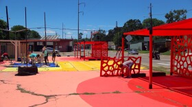 Better Block team and volunteers work to assemble the final stages of Malcom X Plaza.