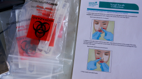 A COVID-19 test kit displayed in New Orleans East in May.