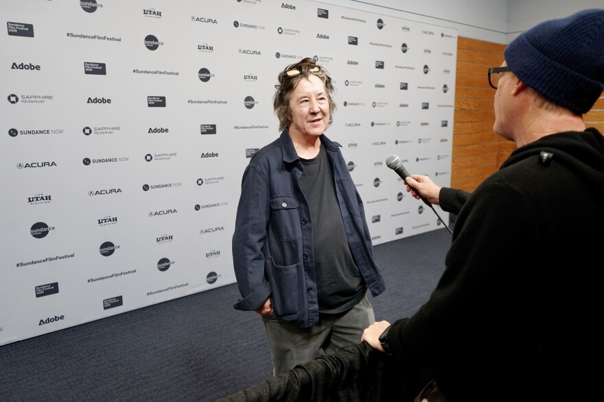 A film producer is interviewed before a movie premiere at Sundance