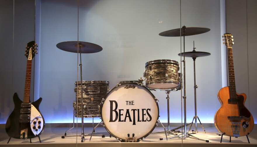 Instruments used by members of The Beatles are displayed at the exhibit "Play It Loud: Instruments of Rock & Roll" at the Metropolitan Museum of Art in New York, Monday, April 1, 2019. The exhibit, which showcases the instruments of rock and roll legends, opens to the public on April 8 and runs until Oct. 1, 2019. (AP Photo/Seth Wenig)