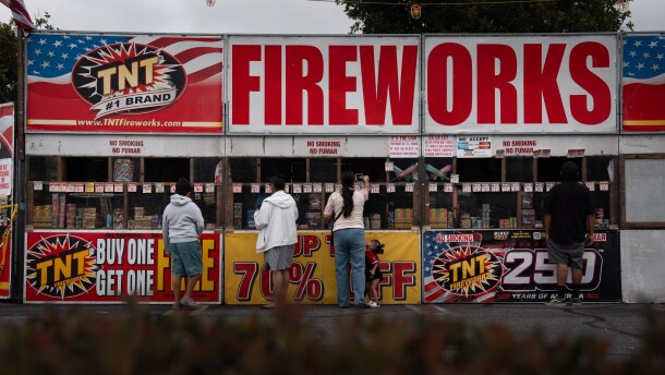 People purchase fireworks at a TNT Fireworks stand in Alhambra, Calif., Tuesday, June 30, 2026, ahead of the Fourth of July holiday. Wildfires are active across the West as the nation heads into its 250th birthday. (AP Photo/Jae C. Hong)