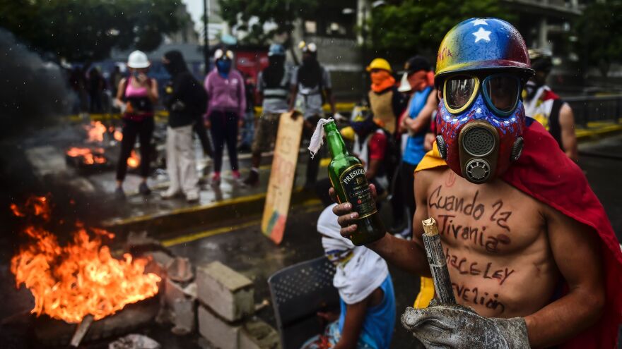 Opposition activists hold a fiery demonstration against the constituent assembly in Caracas on Friday, the day the legislative superbody was inaugurated. Onlookers fear the prospect of escalating violence as opposition activists' alternatives continue to diminish.