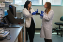 Professor Ai-Ling Lin, left, and doctoral student Kira Ivanich work in Lin’s lab in the Roy Blunt NextGen Precision Health building