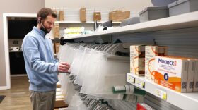 A pharmacist at Mayo Pharmacy in Bismarck, N.D., reviews completed pharmaceutical orders in January 2026.