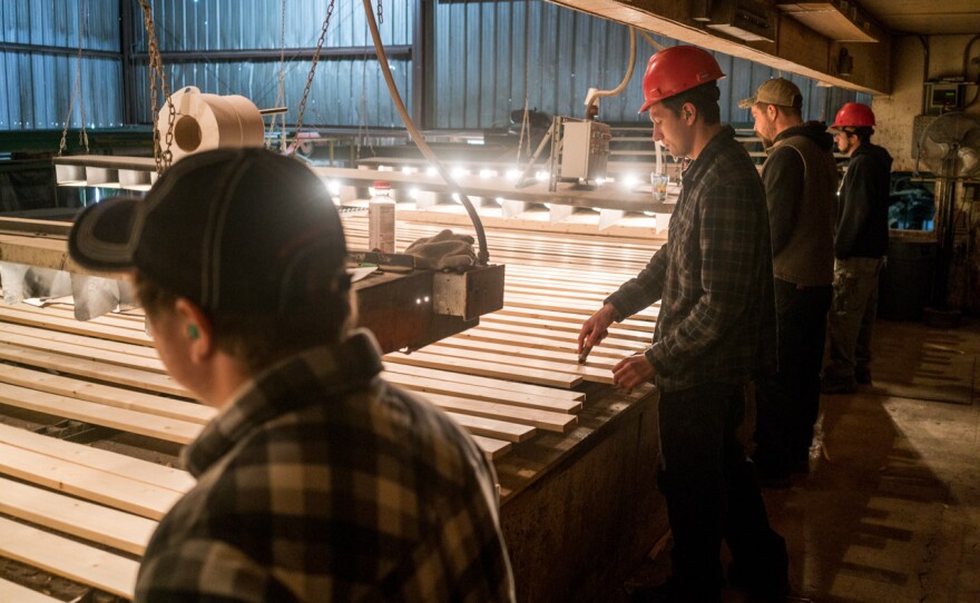 Workers on the line at Pyramid Mountain Lumber Company