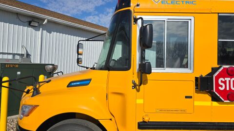 One of the new electric buses operated in the Sioux City School District is shown in a district image.