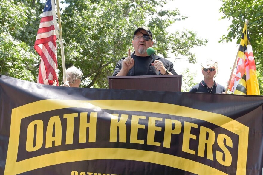  Stewart Rhodes, founder of the Oath Keepers, center, speaks during a rally outside the White House in Washington, June 25, 2017. 