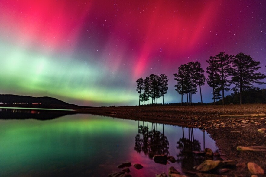 The northern lights over Pactola Lake in the Black Hills on Nov. 11, 2025.