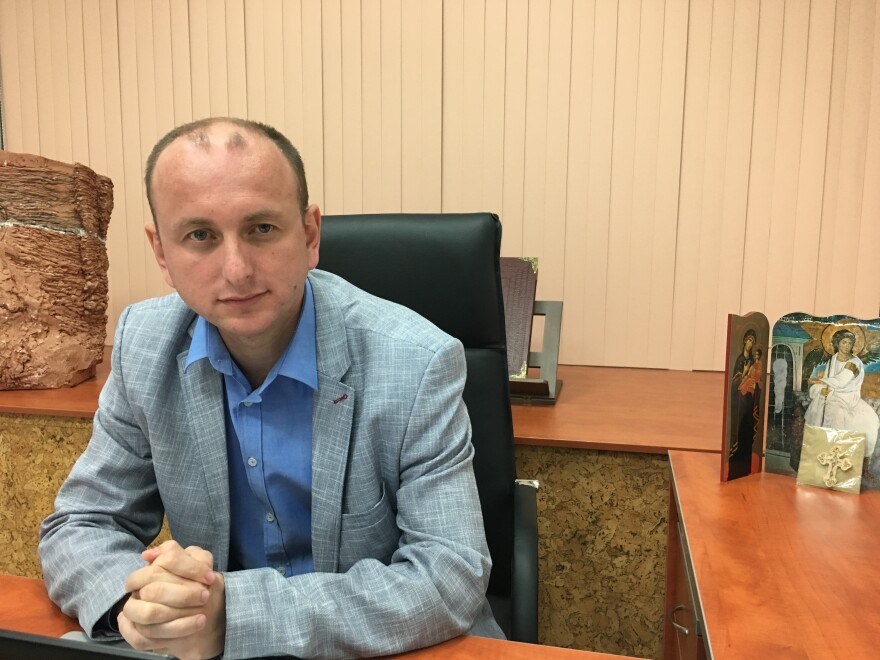 Milan Knezevic, a lawmaker with the Democratic Front, the anti-NATO party which is Montenegro's main opposition, has been implicated in the coup investigation. He denies any involvement and says the governing party fabricated the coup allegations to cover up its corruption and to jail its political opponents.