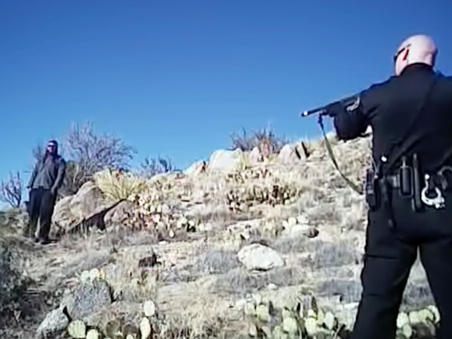 An image from a March 2014 video shows 38-year-old James Boyd (left) before he was fatally shot during a standoff with Albuquerque police officers.