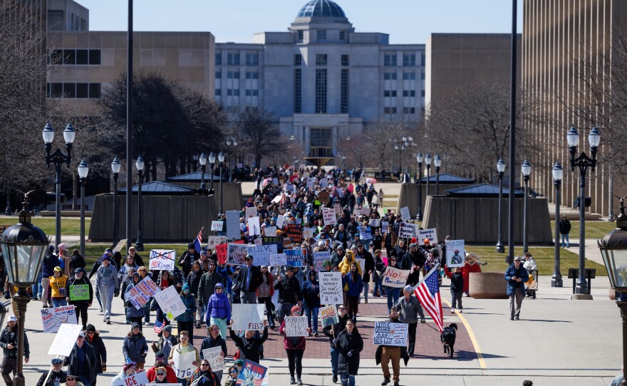 Thousands gathered at the Michigan Capitol in Lansing, Mich., on March 28, 2026, for a No Kings rally.