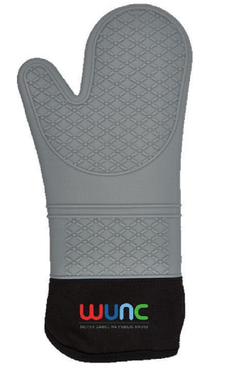 A gray silicon oven mitt with a black cuff featuring the WUNC logo