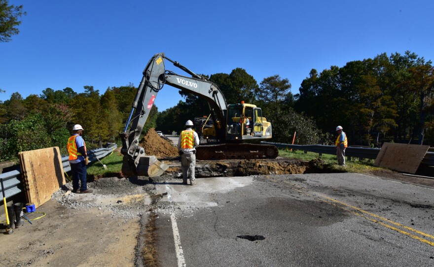 A DOT road crew, in October, working to repair a road that was damaged by flood water. This crew is working on Highway 15, just north of Sumter. 